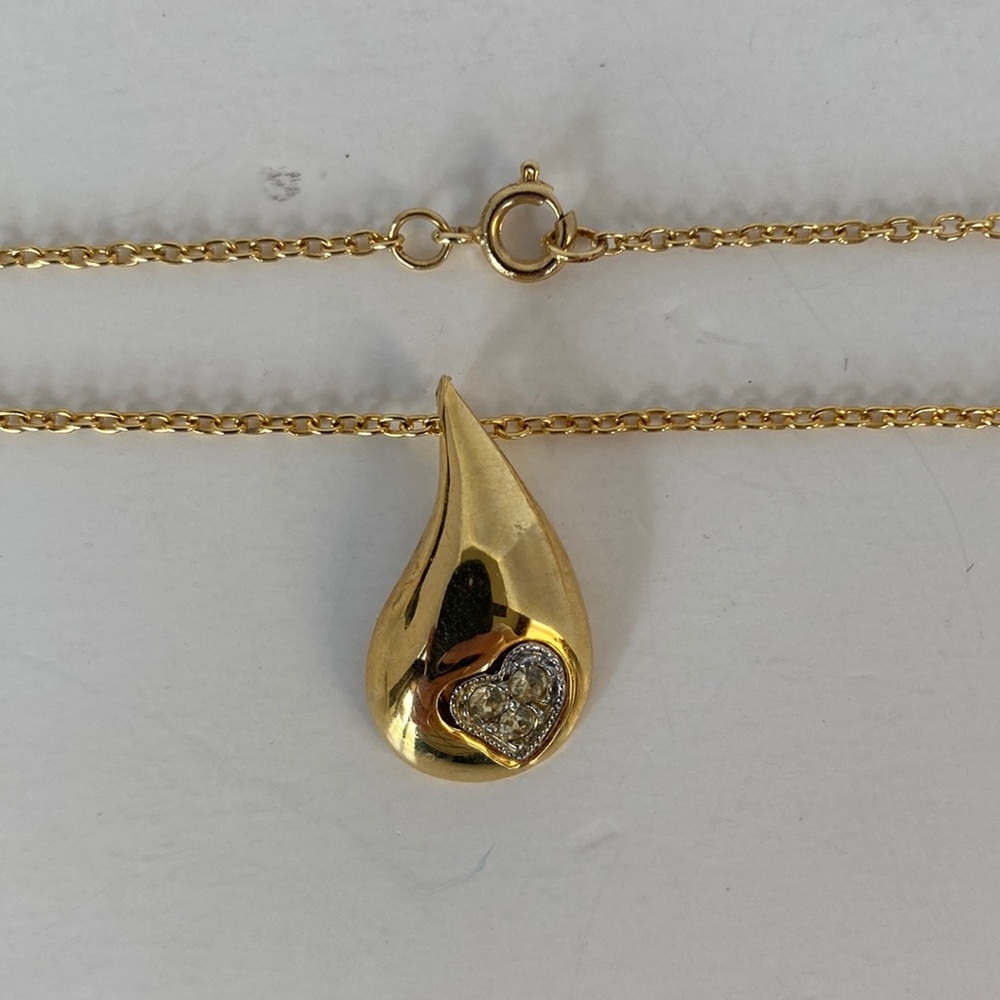 Z31- Costume jewelry- Gold colored necklace with a drop like pendent.